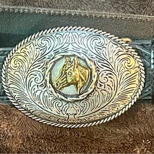 Vintage leather belt with cowboy buckle